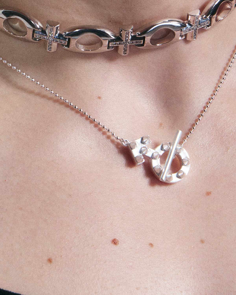 The Enduring Appeal of the Silver Cross Necklace